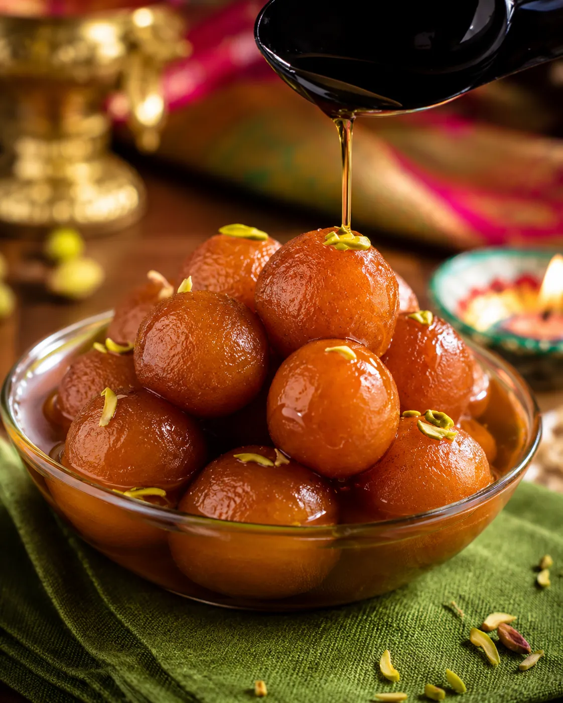 Warm gulab jamun soaked in cardamom sugar syrup at our Gujarati vegetarian restaurant in Hamilton, ON